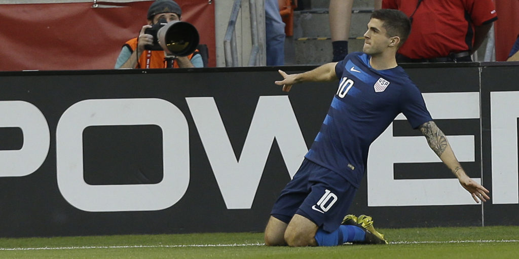 Wright-Phillips eases pressure on Pulisic