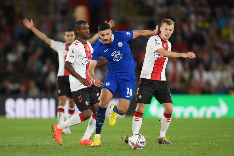 Chelsea's Armando Broja gets past two opponents