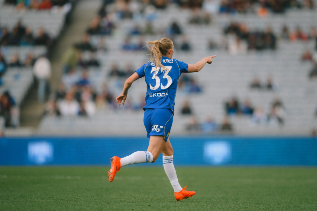 Aggie Beever-Jones celebrates her first half hat-trick.