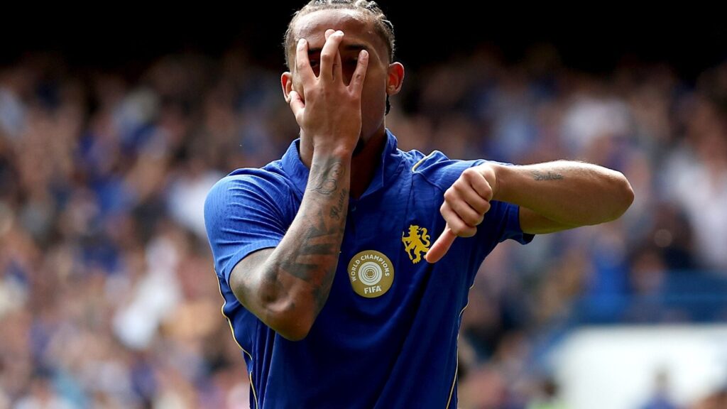 Joao Pedro injury: Joao Pedro wearing a Chelsea kit and gesturing during a match.